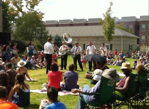 Mr. Taylor and His Dirty Dixie Band steps down from the stage to engage with audience members.